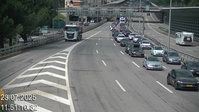 Webcam sur l'A2 en Suisse juste après le passage de la frontière italienne. Vue orientée vers Lugano