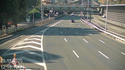 Webcam sur l'A2 en Suisse juste après le passage de la frontière italienne. Vue orientée vers Lugano