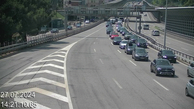 Webcam sur l'A2 en Suisse juste après le passage de la frontière italienne. Vue orientée vers Lugano